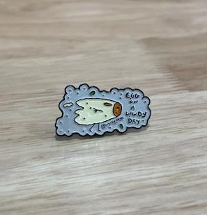 Egg on a Windy Day Enamel Pin @mikepop