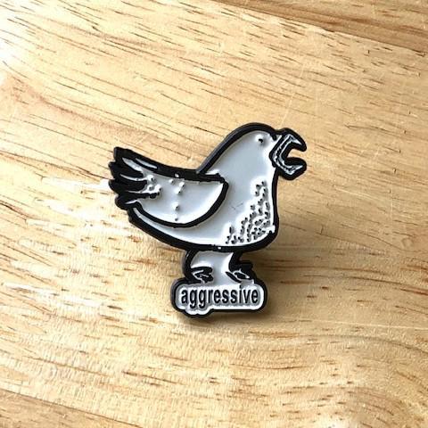 Aggressive Enamel Pin by Ande Lynch